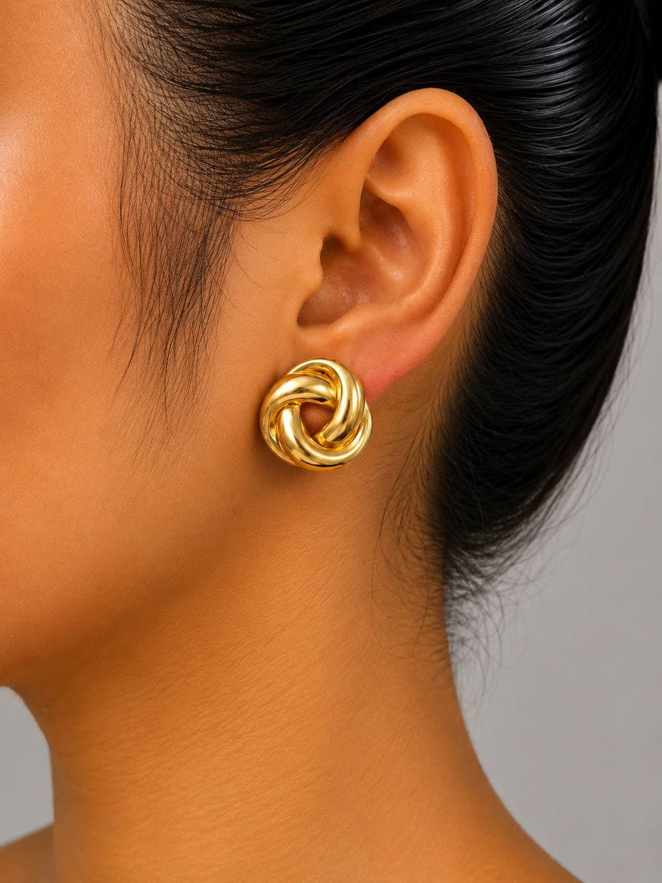 Gold steel earring